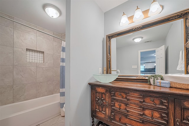 7730 Maple Tree Dr, Houston, TX 77088 - full bathroom with tile patterned floors, vanity, and shower / tub combo with curtain