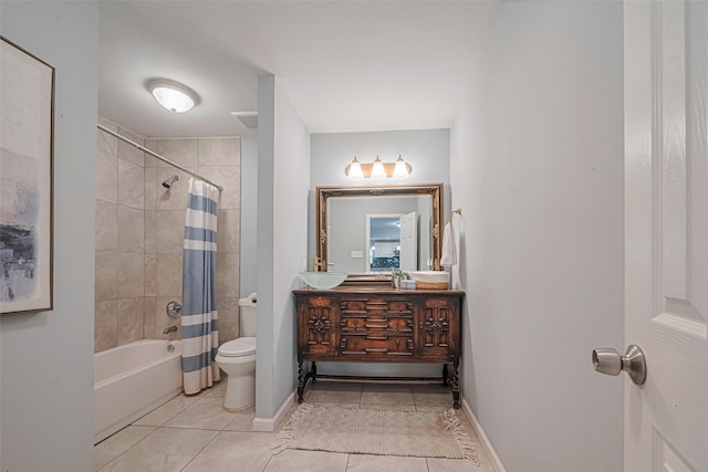 7730 Maple Tree Dr, Houston, TX 77088 - full bathroom featuring tile patterned floors, toilet, shower / bath combination with curtain, baseboards, and vanity