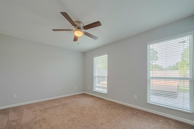 7730 Maple Tree Dr, Houston, TX 77088 - spare room with light colored carpet, baseboards, and ceiling fan