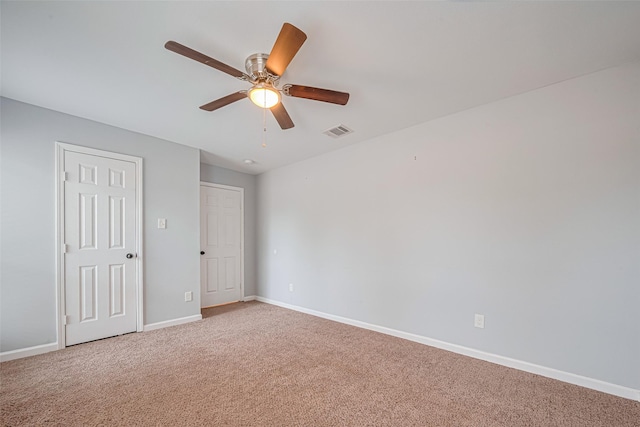 7730 Maple Tree Dr, Houston, TX 77088 - unfurnished bedroom featuring carpet floors, baseboards, and ceiling fan