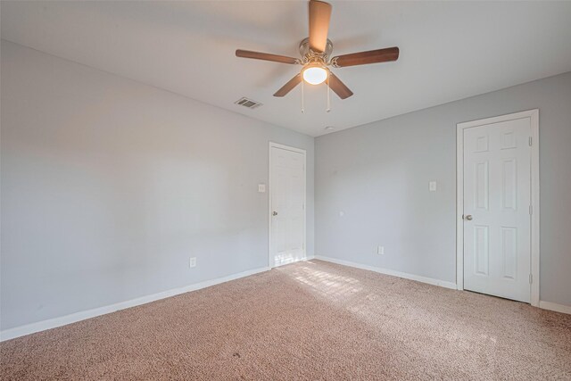 7730 Maple Tree Dr, Houston, TX 77088 - unfurnished room featuring carpet floors, a ceiling fan, and baseboards