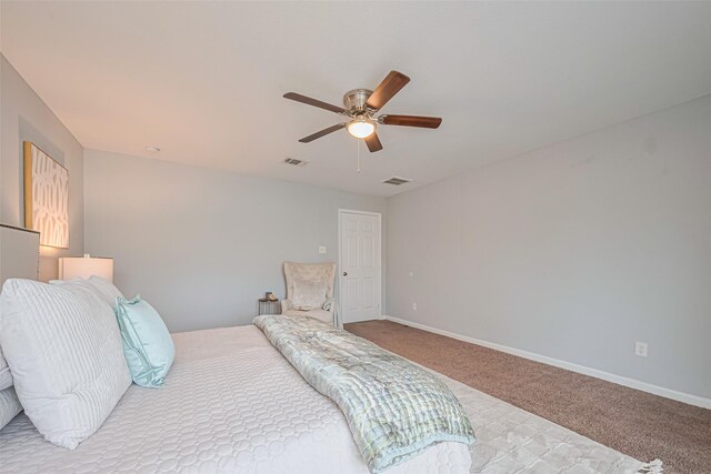 7730 Maple Tree Dr, Houston, TX 77088 - bedroom featuring carpet flooring, a ceiling fan, and baseboards