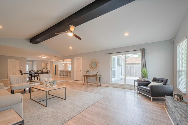 7730 Maple Tree Dr, Houston, TX 77088 - living room featuring light wood finished floors, healthy amount of natural light, a ceiling fan, recessed lighting, and baseboards