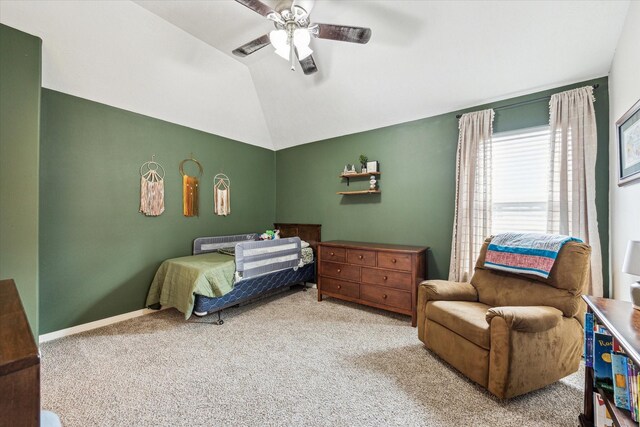 bedroom with carpet flooring, a ceiling fan, and vaulted ceiling