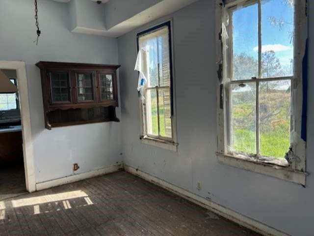 unfurnished dining area featuring a healthy amount of sunlight