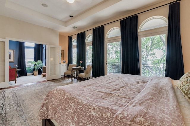 bedroom featuring visible vents and access to exterior