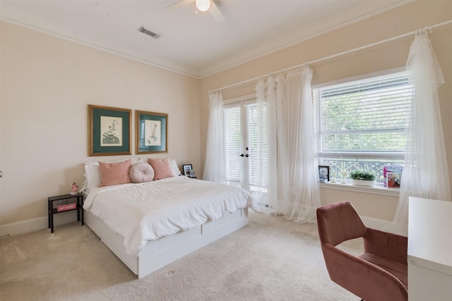 bedroom featuring ornamental molding, visible vents, access to outside, and carpet floors