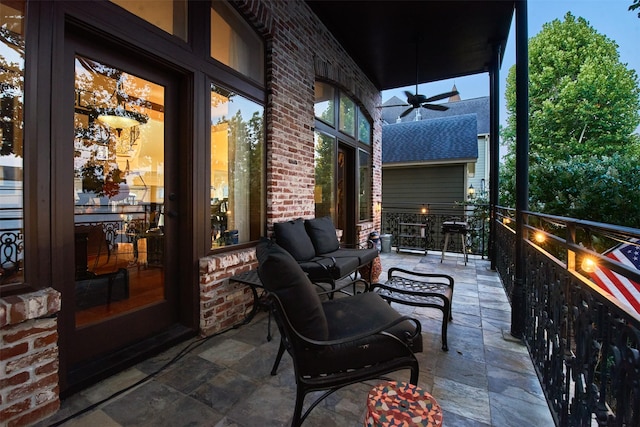 view of patio / terrace featuring ceiling fan