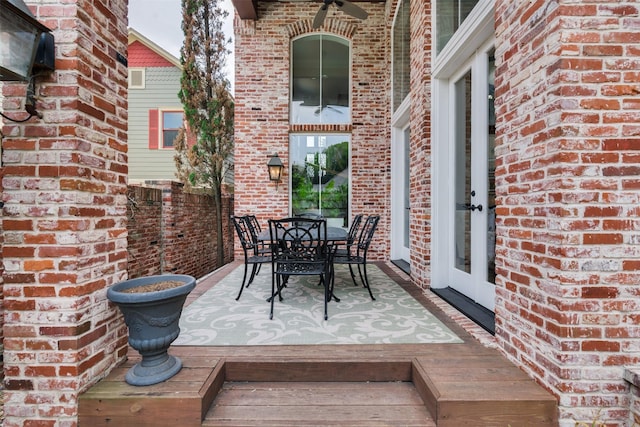 view of patio featuring a deck and outdoor dining area