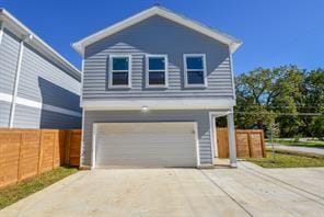 8926 Easthaven Blvd, Houston, TX 77075 - exterior space with an attached garage, fence, and concrete driveway