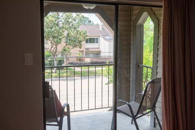 2025 Augusta Dr Unit 208, Houston, TX 77057 - doorway to outside with concrete flooring
