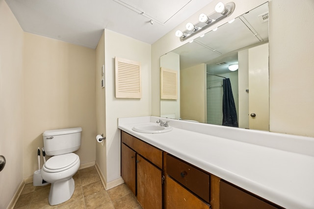 8517 Hearth Dr Unit 31, Houston, TX 77054 - full bathroom with tile patterned floors, vanity, baseboards, toilet, and a shower with shower curtain