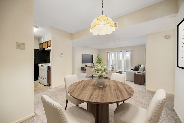 8517 Hearth Dr Unit 31, Houston, TX 77054 - dining room with light carpet and baseboards