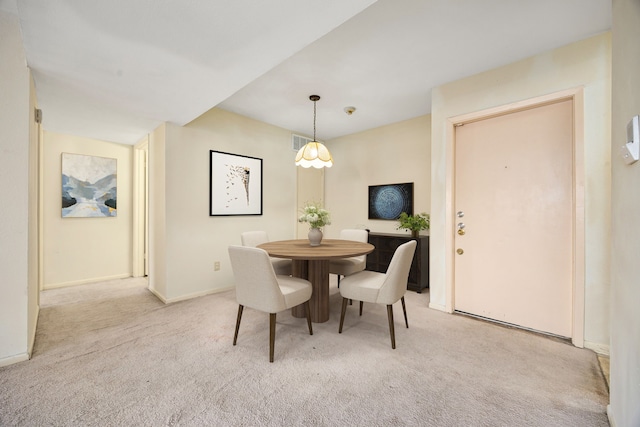 8517 Hearth Dr Unit 31, Houston, TX 77054 - dining area featuring light colored carpet, baseboards, and visible vents