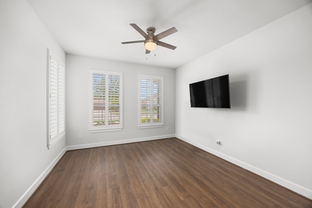 28928 Autumn Shore Dr, Fulshear, TX 77441 - empty room featuring dark wood-type flooring, ceiling fan, and baseboards