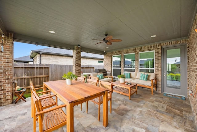 28928 Autumn Shore Dr, Fulshear, TX 77441 - fenced backyard with a patio area, outdoor lounge area, a ceiling fan, and outdoor dining space
