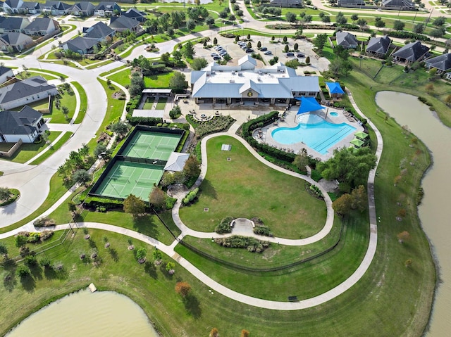 28928 Autumn Shore Dr, Fulshear, TX 77441 - aerial view of property and surrounding area with nearby suburban area, a nearby body of water, and a pool area