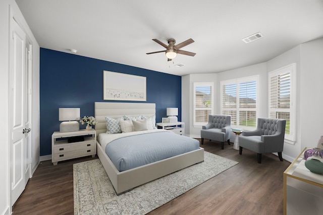 28928 Autumn Shore Dr, Fulshear, TX 77441 - bedroom with baseboards, multiple windows, dark wood-style floors, and ceiling fan