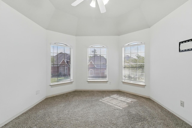 16311 Perry Pass Ct, Spring, TX 77379 - spare room with plenty of natural light, carpet, ceiling fan, vaulted ceiling, and baseboards