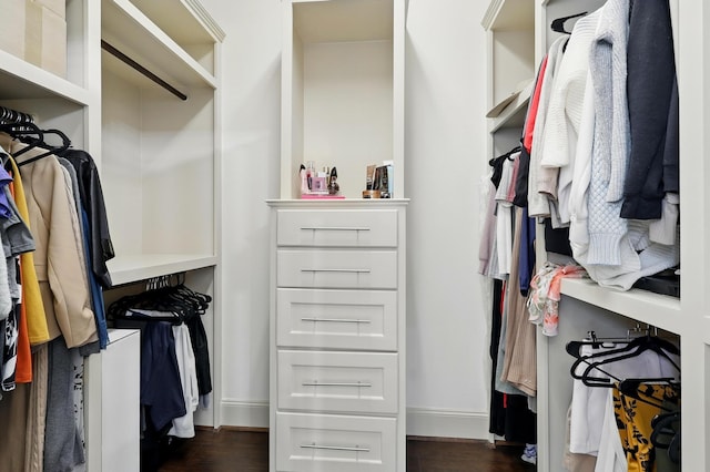 16311 Perry Pass Ct, Spring, TX 77379 - spacious closet featuring dark wood-type flooring