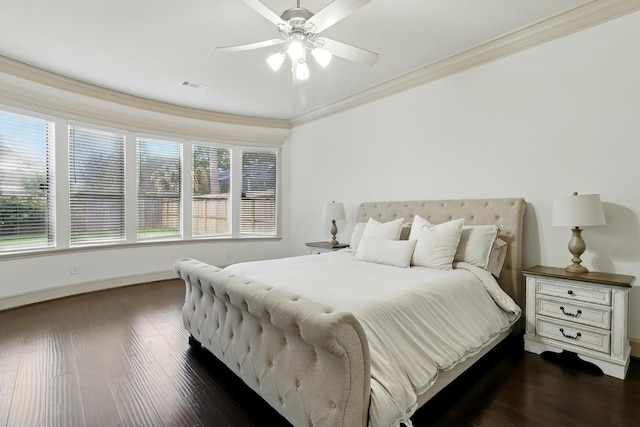 16311 Perry Pass Ct, Spring, TX 77379 - bedroom with ornamental molding, dark wood-type flooring, baseboards, and a ceiling fan