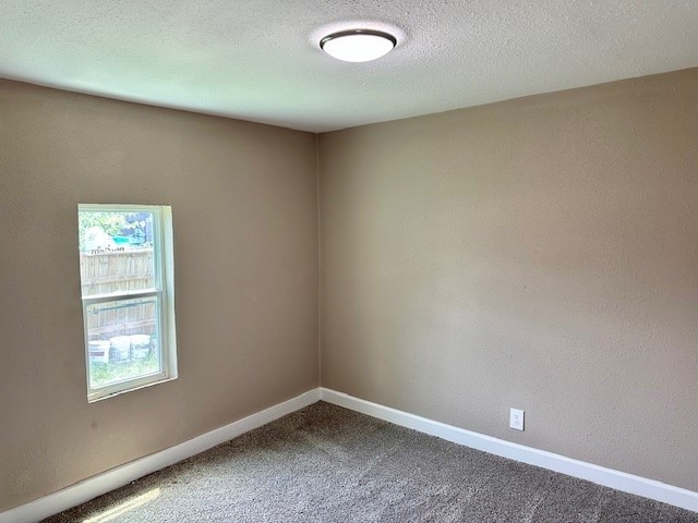 8230 Woodward St, Houston, TX 77051 - unfurnished room featuring carpet flooring and baseboards