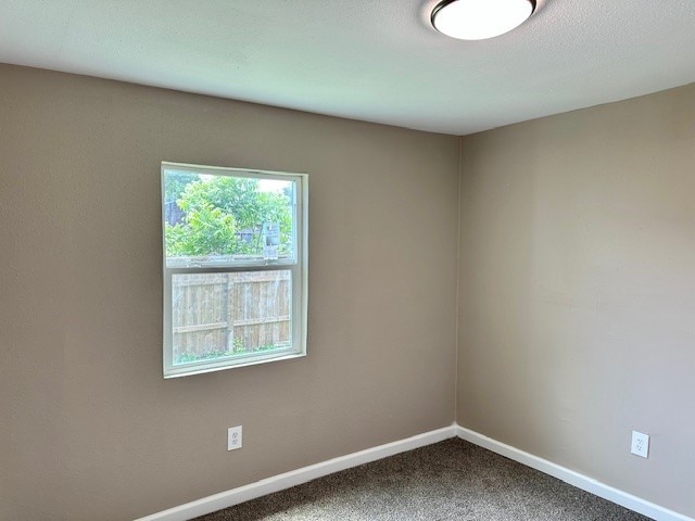 8230 Woodward St, Houston, TX 77051 - carpeted spare room featuring baseboards