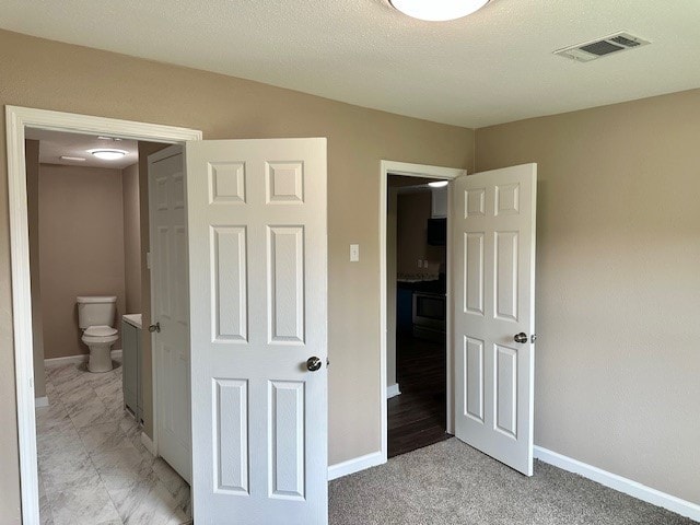 8230 Woodward St, Houston, TX 77051 - unfurnished bedroom featuring visible vents and baseboards