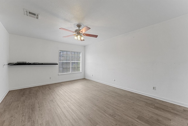 11887 Algonquin Dr, Houston, TX 77089 - spare room with wood finished floors, ceiling fan, and baseboards