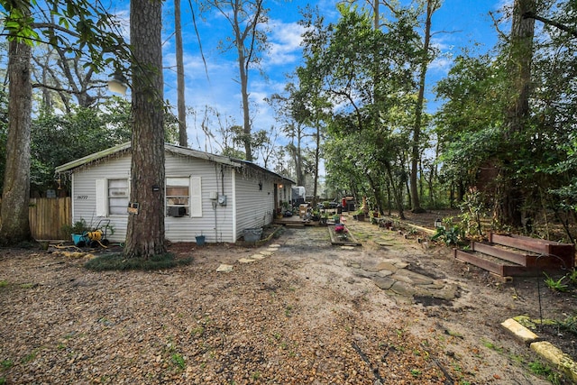 16777 Stinson Ln, Montgomery, TX 77316 - view of property exterior with fence and cooling unit
