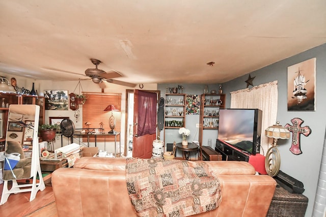 16777 Stinson Ln, Montgomery, TX 77316 - living room featuring a ceiling fan and wood finished floors