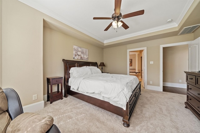 514 Whitney Oaks Ln, Stafford, TX 77477 - bedroom with visible vents, crown molding, ensuite bath, carpet floors, and a raised ceiling