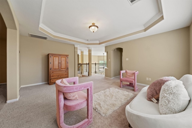514 Whitney Oaks Ln, Stafford, TX 77477 - interior space with carpet flooring, arched walkways, visible vents, ornate columns, and a raised ceiling