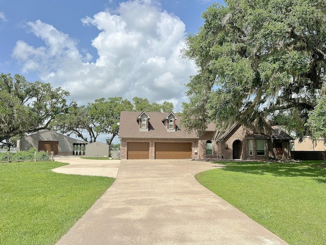view of front of house with concrete driveway, a front lawn, and brick siding