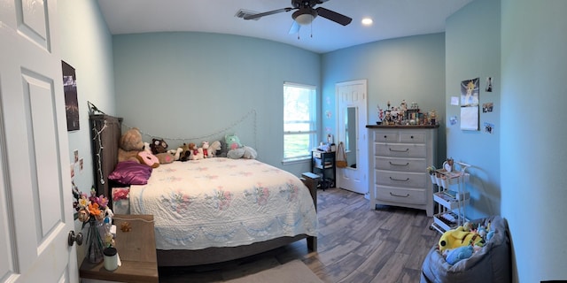 bedroom featuring recessed lighting, a ceiling fan, visible vents, and wood finished floors