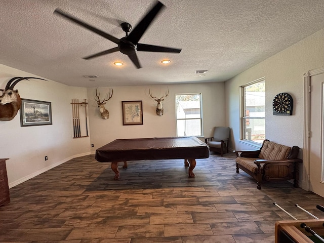 recreation room featuring wood finished floors, a ceiling fan, a textured ceiling, and pool table