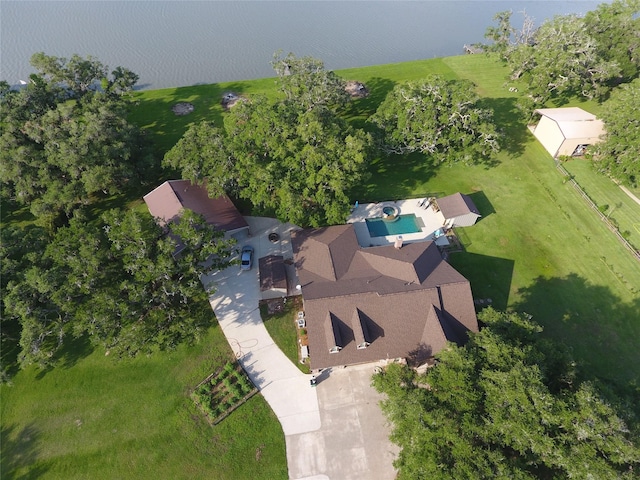 birds eye view of property featuring a water view