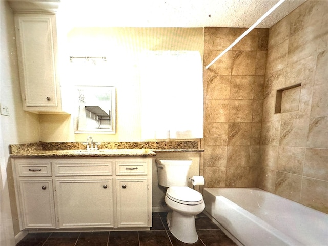full bath with vanity, toilet, tile patterned flooring, and shower / bathing tub combination