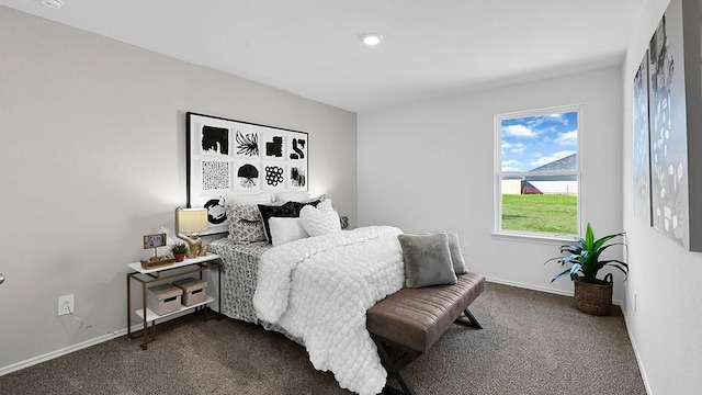 2707 Misty Elm Ln, Rosenberg, TX 77469 - bedroom featuring dark colored carpet and baseboards