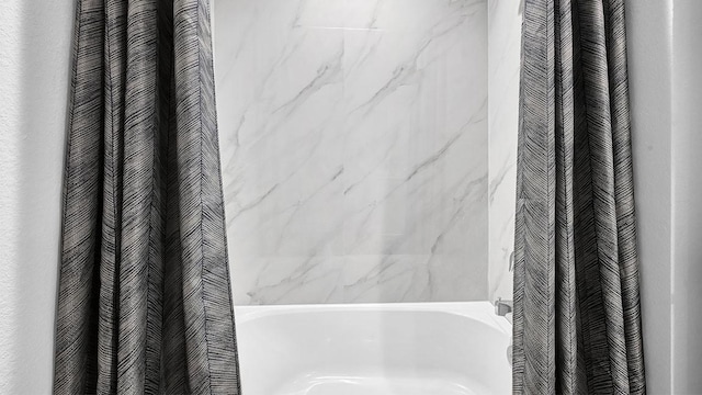 2707 Misty Elm Ln, Rosenberg, TX 77469 - full bathroom featuring shower / bath combination with curtain