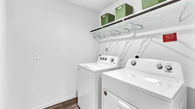 2707 Misty Elm Ln, Rosenberg, TX 77469 - washroom with independent washer and dryer, dark wood-type flooring, and baseboards