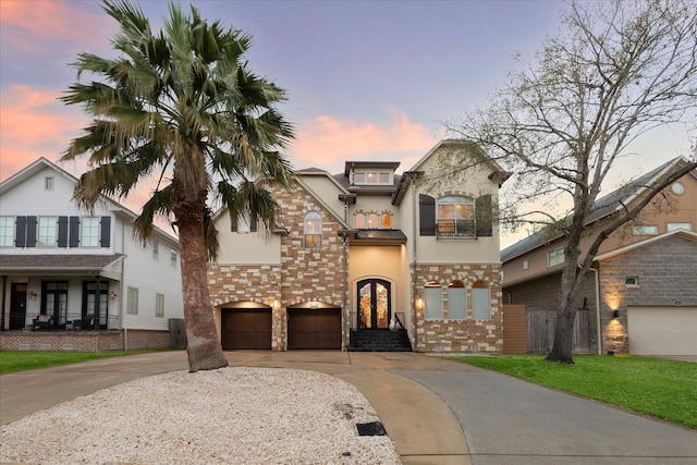 3822 Drummond St, Houston, TX 77025 - view of front of property with concrete driveway, a garage, a balcony, stucco siding, and french doors
