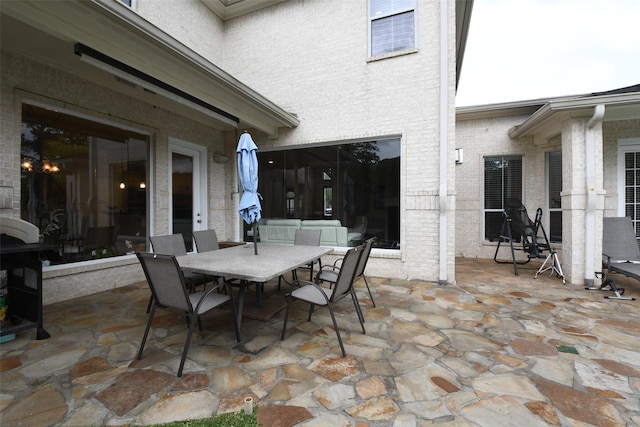 view of patio with outdoor dining space
