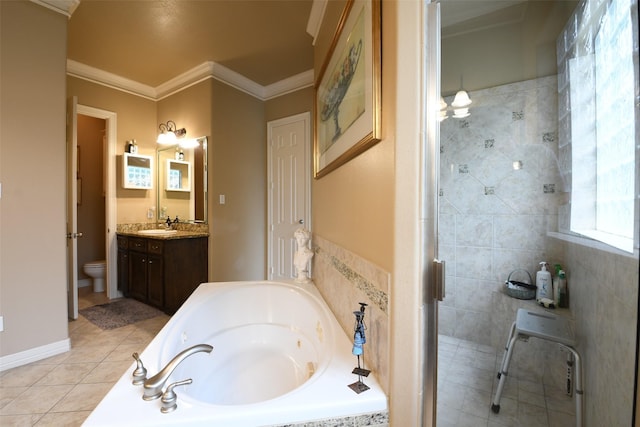 7414 Regency Pl, Spring, TX 77379 - bathroom featuring vanity, toilet, tile patterned floors, tiled shower, and a garden tub