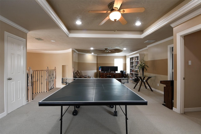 7414 Regency Pl, Spring, TX 77379 - game room with crown molding, visible vents, ceiling fan, a tray ceiling, and carpet flooring