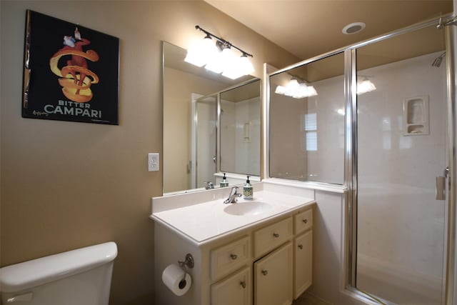 7414 Regency Pl, Spring, TX 77379 - full bathroom featuring toilet, a shower stall, and vanity