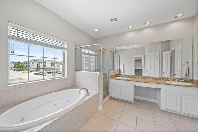 13611 Brookbluff Ln, Houston, TX 77077 - full bathroom with double vanity, a tub with jets, a stall shower, and a sink