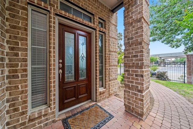 13611 Brookbluff Ln, Houston, TX 77077 - property entrance featuring brick siding and fence