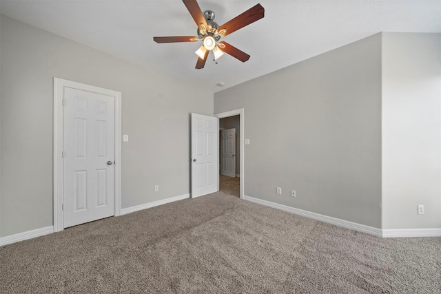 13611 Brookbluff Ln, Houston, TX 77077 - unfurnished bedroom with carpet flooring, baseboards, and ceiling fan