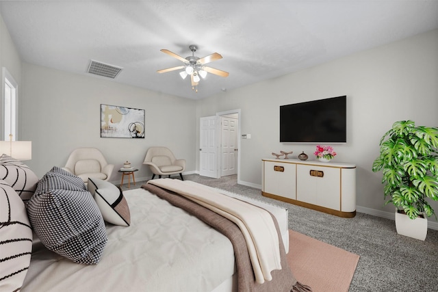 13611 Brookbluff Ln, Houston, TX 77077 - carpeted bedroom with visible vents, baseboards, and ceiling fan